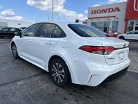 This 2023 Toyota Corolla Hybrid LE boasts impressive fuel efficiency and a smooth, comfortable ride,... (image 6)