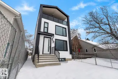 Rare 5-unit income property in Cromdale, backing onto Rat Creek with views of downtown and the stadi...