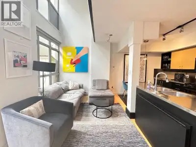 Experience the ultimate upscale living in the heart of Yaletown with this stunning 1-bedroom, 1-bath...