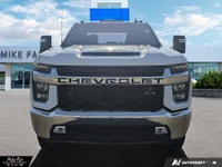 2500 4WD Crew Cab – Summit White with Jet Black interior, deep tint rear glass, power door locks, re... (image 1)