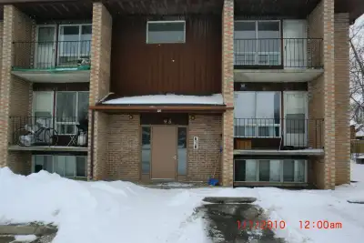 Quiet Building, Balcony, parking, water supplied, new floors ,repainted , Main floor, laundry