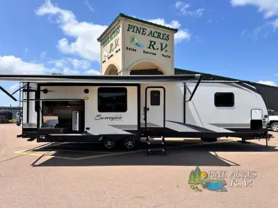 Forest River Surveyor Luxury travel trailer 33KRLOK highlights: Window Bench Retreat 2 Opposing Rear...
