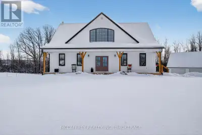 Welcome to 806 Newburgh Road, a stunning custom-built (2019) modern farmhouse set on a picturesque c...