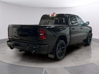 Experience the power and style of the 2026 Ram 1500 Sport, a striking black 4x4 truck designed to ha... (image 4)