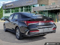 This 2024 Hyundai Elantra Essential shines with its sleek Abyss Black exterior and practical feature... (image 2)