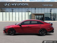 The 2025 Hyundai Elantra N, cloaked in striking Ultimate Red, delivers an adrenaline rush with its f... (image 1)
