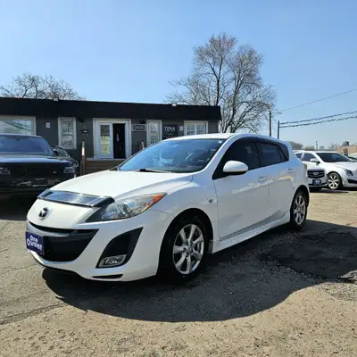 This 2010 Mazda MAZDA3 Sport is a sleek and reliable hatchback that's perfect for your daily drives!...