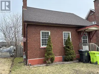 Tucked away in a quiet location on Sixth Avenue, this charming 1.5-storey brick home is close to all...