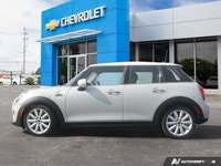 Navigate city streets with playful confidence and undeniable style in this 2021 MINI 5 Door Cooper H... (image 2)