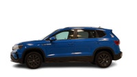 Welcome to BMW Regina 2024 Volkswagen Taos 4D Sport Utility Comfortline Cornflower Blue 4-Wheel Disc... (image 7)
