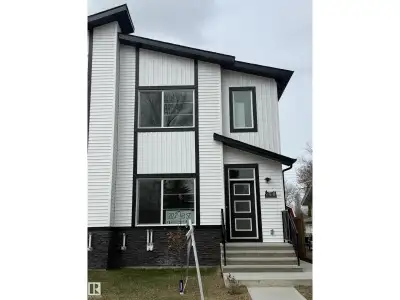 This quality-built home features a side entry to a 2-bedroom legal suite, offering a total of 6 bedr...