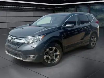 The 2018 Honda CR-V EX-L AWD in striking gray is the perfect blend of versatility and style, designe...