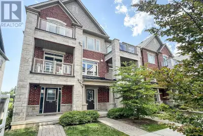 Special end-unit in the community (approx. 1,400 sq.ft. above grade), this stunning 3-bedroom + Den...