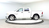 The Ram 1500 Classic SLT, presented in a striking white, is a robust and reliable 4x4 truck, ideal f... (image 1)
