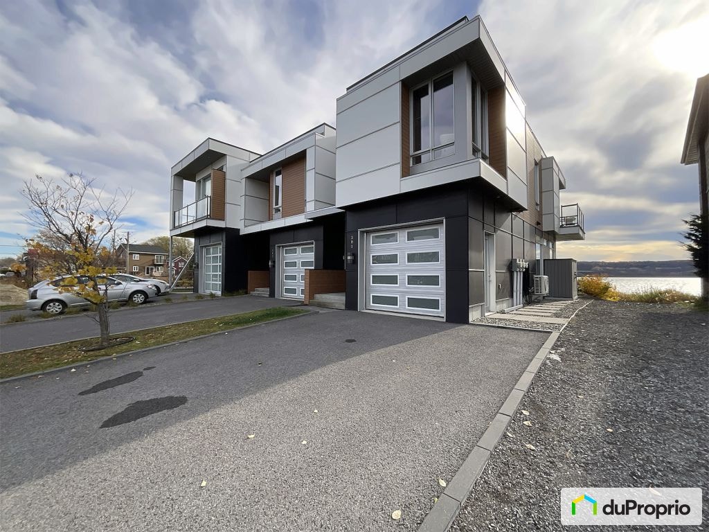 $734,500 - Townhouse for sale in L'Ange-Gardien — photo 1
