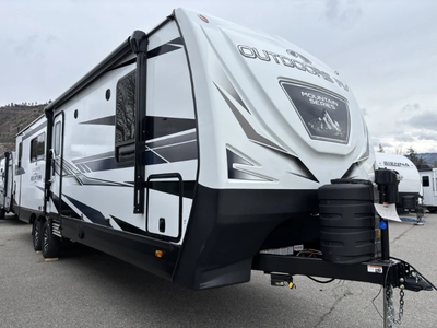 With a king bed slide, theatre seating, and large holding tanks, this unit is ideal for couples who...