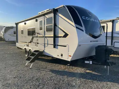 We are looking for good pre owned Rv's to buy or consign!! Keystone Cougar Half-Ton travel trailer 2...