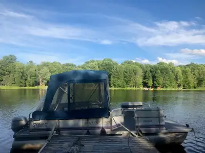 CHEAP PONTOON BOAT WITH THE HALF ENCLOSURE KIT BIG DIAMETER PONTOONS CAN BE BOUGHT WITH OR WITHOUT A...