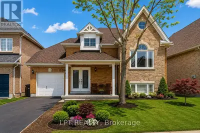 Welcome Home! This fabulous detached bungalow offers a rare walk-out basement with a private separat...