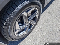 The 2024 Hyundai Tucson Hybrid Luxury, in stunning Deep Sea Blue, represents the pinnacle of modern... (image 8)