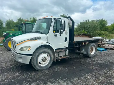2006 M2 Freightliner single axle Cat C7 ENG with 6spd manual Trans 105,577 KM , 12' steel deck, Hydr...