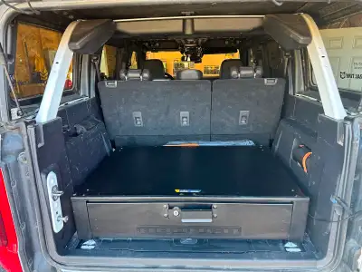 OEM Ford Bronco Security Drawer/ Tool box. There are scuffs/scratches on the surface. No issues with...