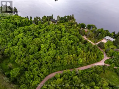 Discover the perfect canvas for your dream home or off-water cottage at 210 Allisons Point Rd. This...