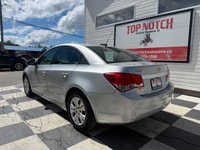 A practical compact sedan with a comfortable interior, modern convenience features, and efficient pe... (image 5)