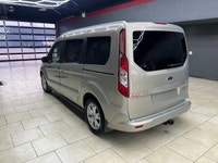 Experience the elegance and sophistication of the gold 2015 Ford Transit Connect Wagon Titanium with... (image 5)