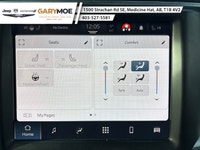 The 2022 Ram 1500 Classic SLT 4x4 Crew Cab stands out with its sophisticated gray exterior and power... (image 9)