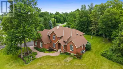 Incredible value in prestigious Marchvale Estates! Set on a private 2-acre lot, this impressive full...