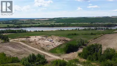 Located in the heart of northern Alberta, this 51.60-acre property features a fully operational Clas...