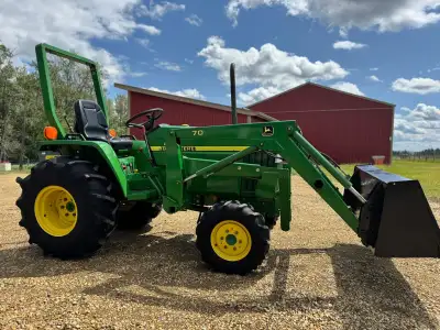 John Deere 790 with loader and ONLY 690hrs, View more