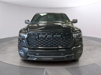 The 2026 Ram 1500 Express 4x4 Crew Cab 57 Box is a powerful yet stylish black truck thats ready for... (image 7)