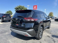 Slide into this sleek 2022 Nissan Rogue SV, boasting a Super Black exterior and a surprisingly spaci... (image 4)
