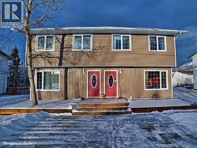 Welcome to 148 and 150 Dawson Drive, a rare investment opportunity in the heart of Faro, Yukon. This...