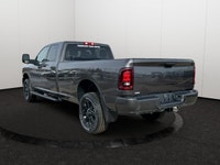 This 2026 RAM 2500 TRADESMAN CREW CAB 4X4 has the following options Cloth 40/20/40 Bench Seat, 8.4 T... (image 3)