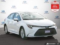 Recent Arrival! Odometer is 14620 kilometers below market average! White 2024 Toyota Corolla LE SUNR... (image 6)