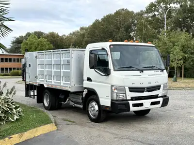 2014 Mitsubishi Fuso Dump with Tommy lift gate Flatbed measurements 13FT Long 7FT 8in. Wide 3FT 8in....
