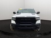 This *2025 Ram 1500 Rebel Crew Cab 4x4* in *Bright White* represents the newest chapter of Ram perfo... (image 5)