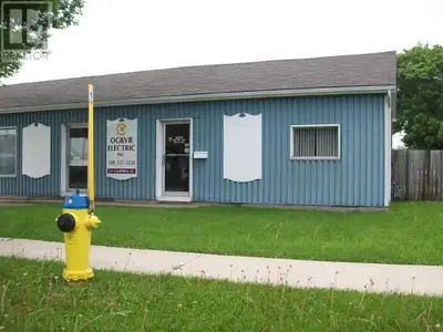 Approximately 3200 square feet featuring 2 overhead doors, large shop space, a fenced compound, and...