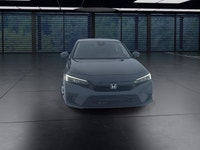 The 2024 Honda Civic Sedan LX-B CVT in sophisticated gray combines front-wheel drive with precise ha... (image 2)