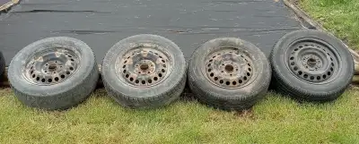 195/60 R15 Tires with 5 Bolt Rims with Winter Tires. No much tread left on the tires. Great for an e...