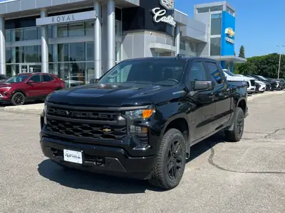 The 2026 Chevrolet Silverado 1500 Custom Crew Cab Short Box 4-Wheel Drive in black is designed for r...