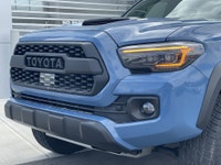 AMVIC Licensed Dealer The 2018 Toyota Tacoma TRD Off Road 4x4 Double Cab, finished in Blazing Blue M... (image 2)