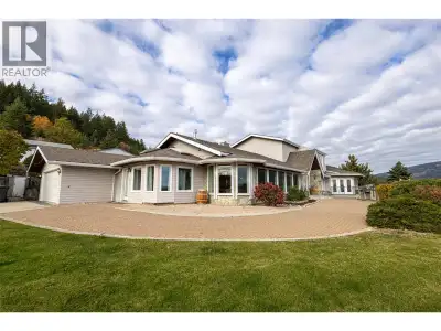 Experience ultimate luxury at this 10-acre estate with breathtaking West Kelowna views. The massive...