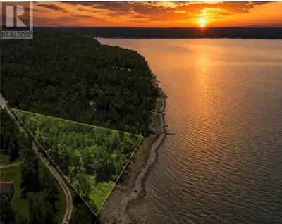 Stunning Waterfront Lot with Panoramic Views! This triangular shaped waterfront lot boasts an impres...