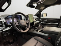 This 2026 RAM 1500 REBEL CREW CAB 4X4 has the following options Lux Leather Trimmed Bucket Seats, Re... (image 9)