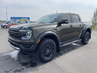 The 2024 Ford Ranger Raptor, finished in Shelter Green with refined Ebony leather-trimmed seats, is... (image 3)
