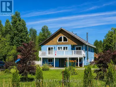 Escape to the peace and privacy of country living with this spacious 4+1 bedroom, 2-bathroom home si...